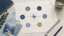 Abstract career-interest map with six work activity icons around a compass.